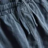 7–15 år | sett med strukturert kortærmet skjorte med knapper og shorts