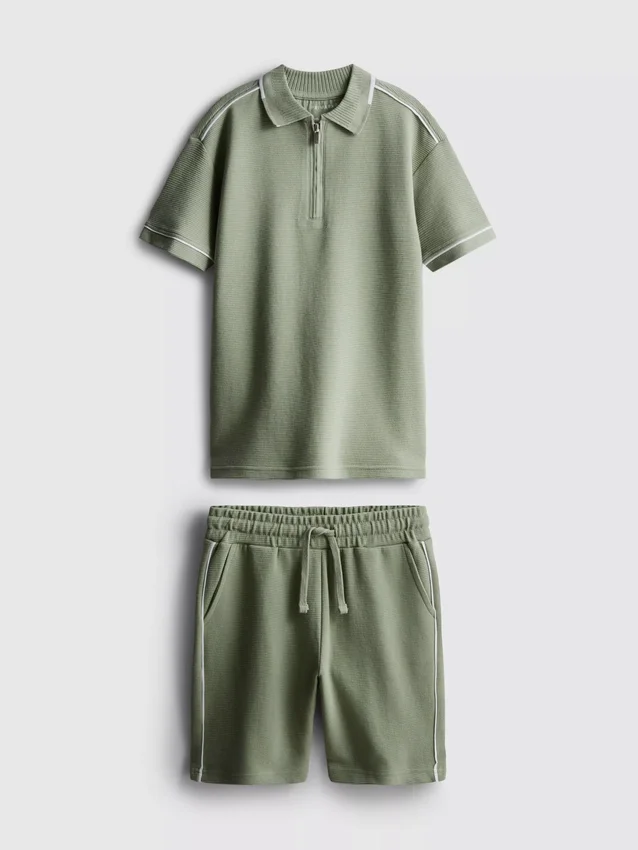 7–15 år | sett med strukturert poloskjorte og shorts