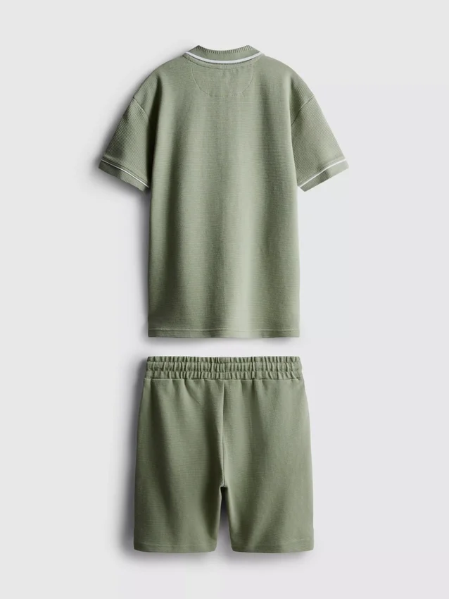 7–15 år | sett med strukturert poloskjorte og shorts