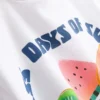 7–15 år | T-skjorte med fruktmotiv og strukturert overflate