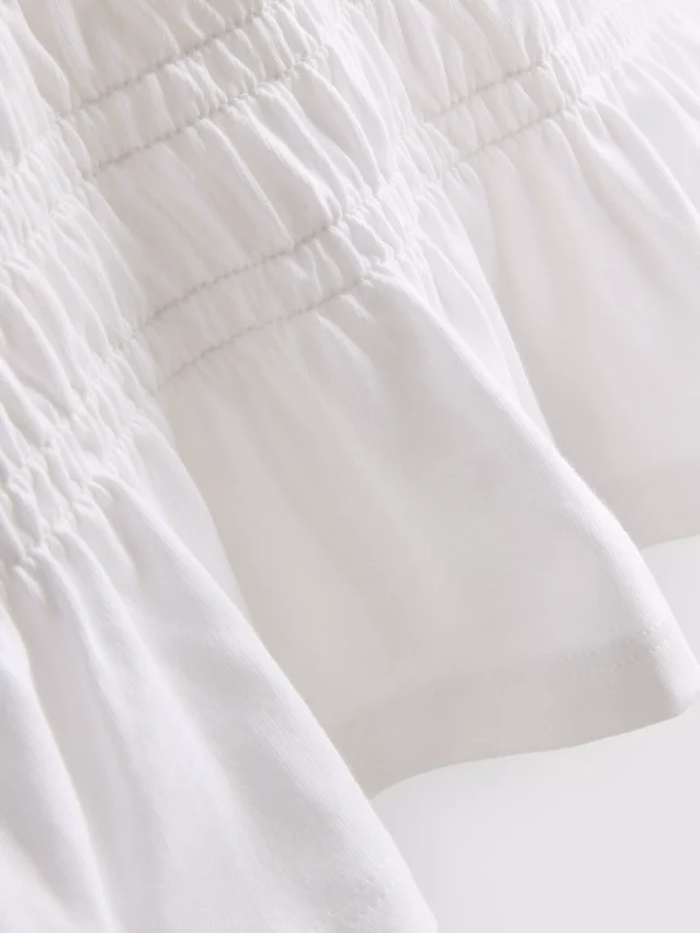 7–15 år | T-skjorte med rynket peplum