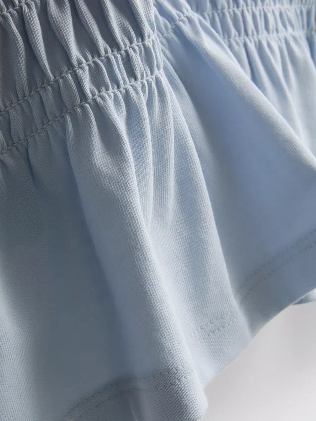 7–15 år | T-skjorte med rynket peplum