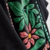 7–15 år | T-skjorte med strukturert blomstermotiv