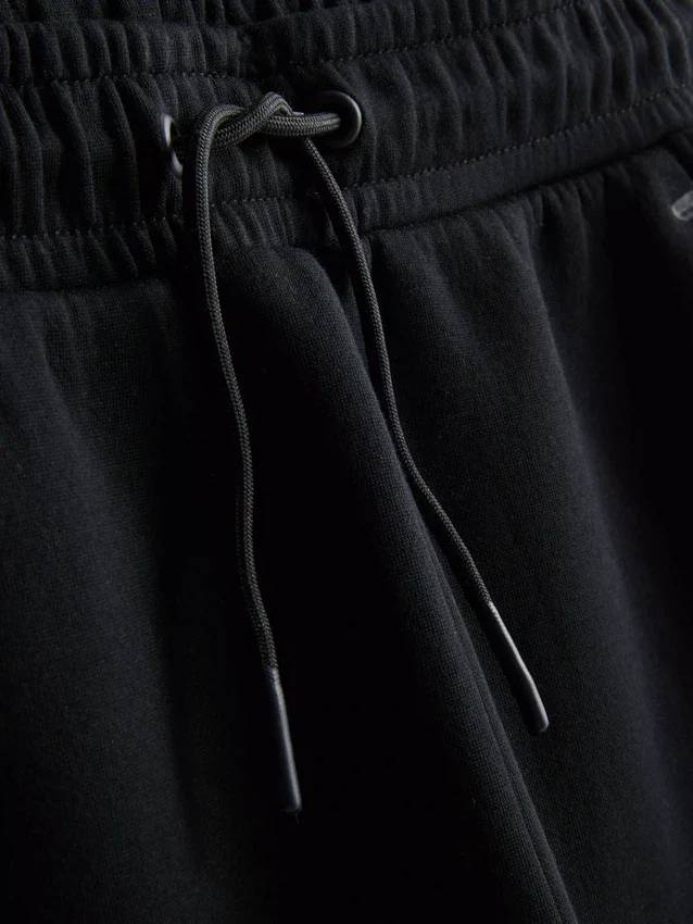 9–15 år | Joggebukser med mansjetter