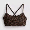 Aktiv kort topp med leopardmønster og racerrygg