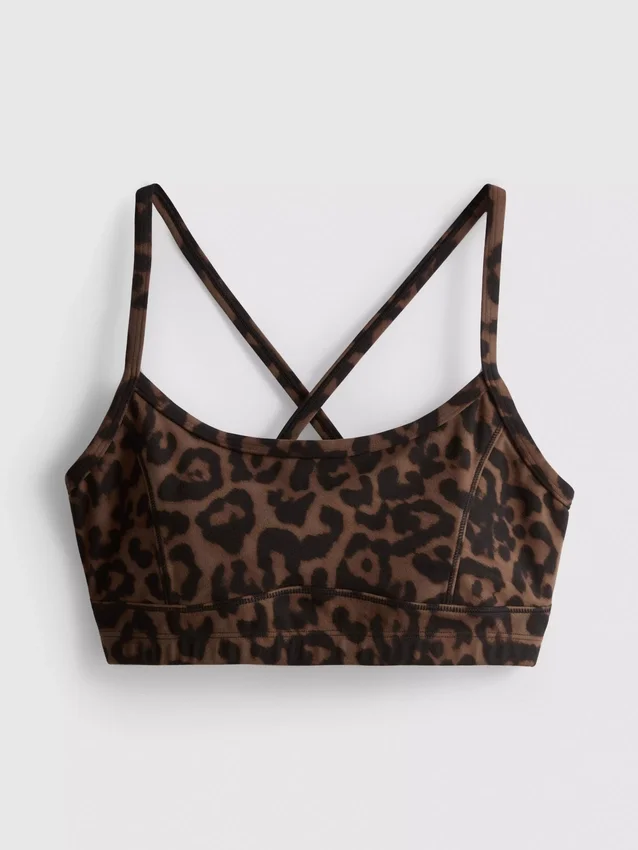 Aktiv kort topp med leopardmønster og racerrygg