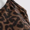 Aktiv kort topp med leopardmønster og racerrygg