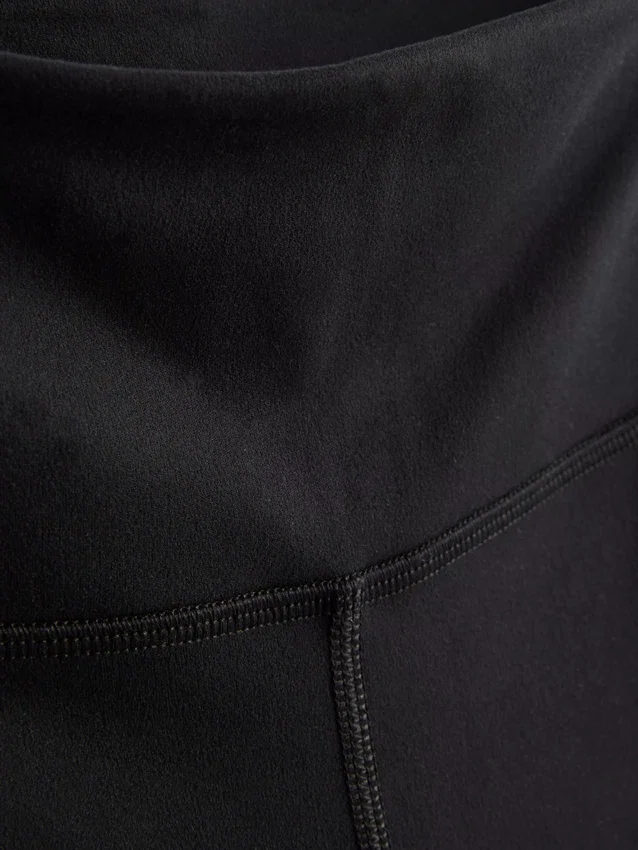 Aktive leggings med høy midje, jevn støtte og utvidet ben