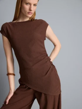 Asymmetrisk krøllet topp