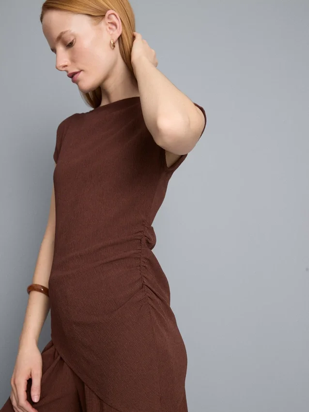Asymmetrisk krøllet topp