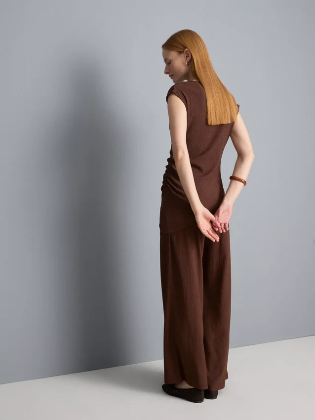 Asymmetrisk krøllet topp
