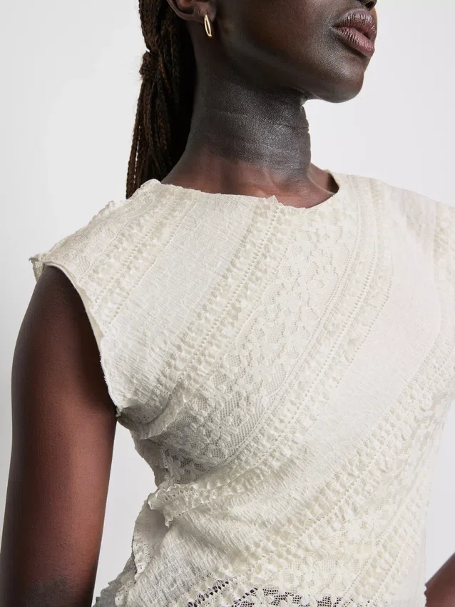Asymmetrisk tank-top i blonder