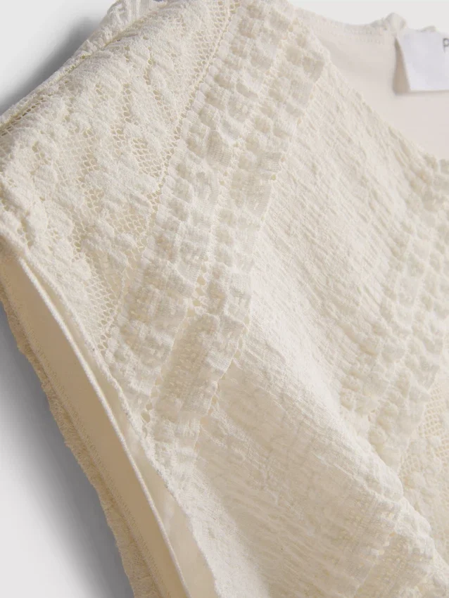 Asymmetrisk tank-top i blonder
