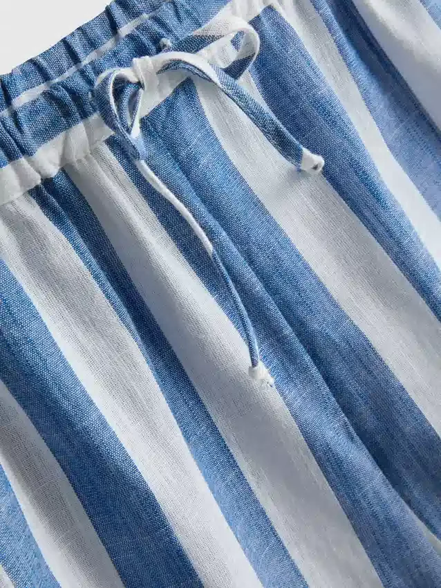 Avslappede, stripete strandshorts i bomull