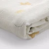Babyteppe i musselin med dyremotiv