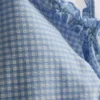 Badedrakt med volanger i gingham-mønster