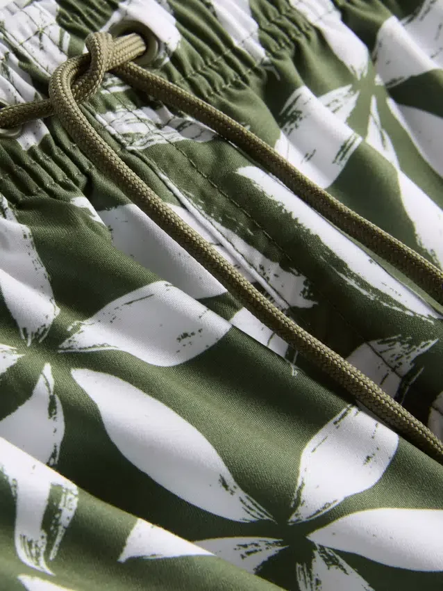 Badeshorts med blomstermønster og snøring