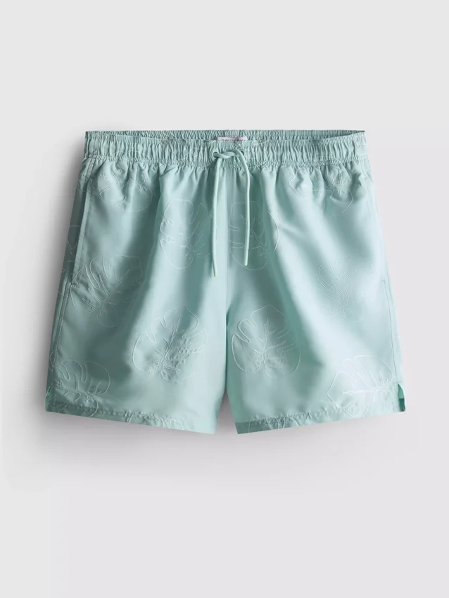 Badeshorts med brodert bladmønster