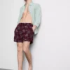 Badeshorts med brodert palmetre