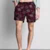 Badeshorts med brodert palmetre
