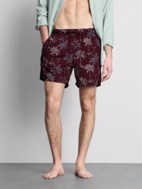 Badeshorts med brodert palmetre