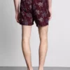 Badeshorts med brodert palmetre