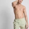 Badeshorts med palmetre-mønster