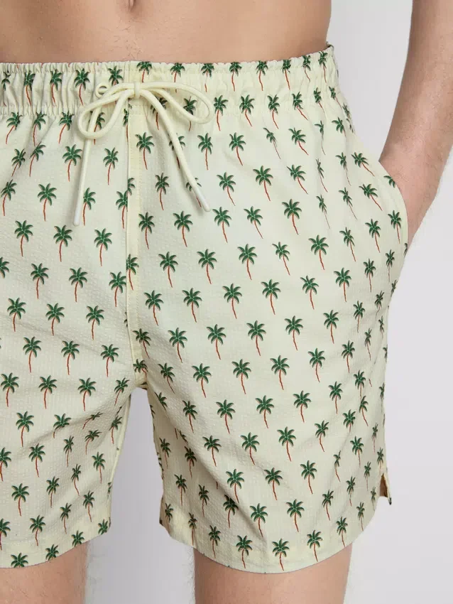 Badeshorts med palmetre-mønster