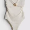 Bandeau-badedrakt med skjelldetaljer