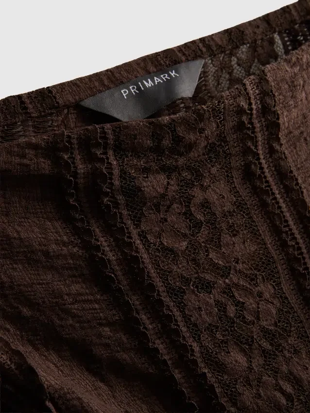 Bandeau-top i bomullsblanding med blonder