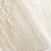 Bandeau-top i bomullsblanding med blonder