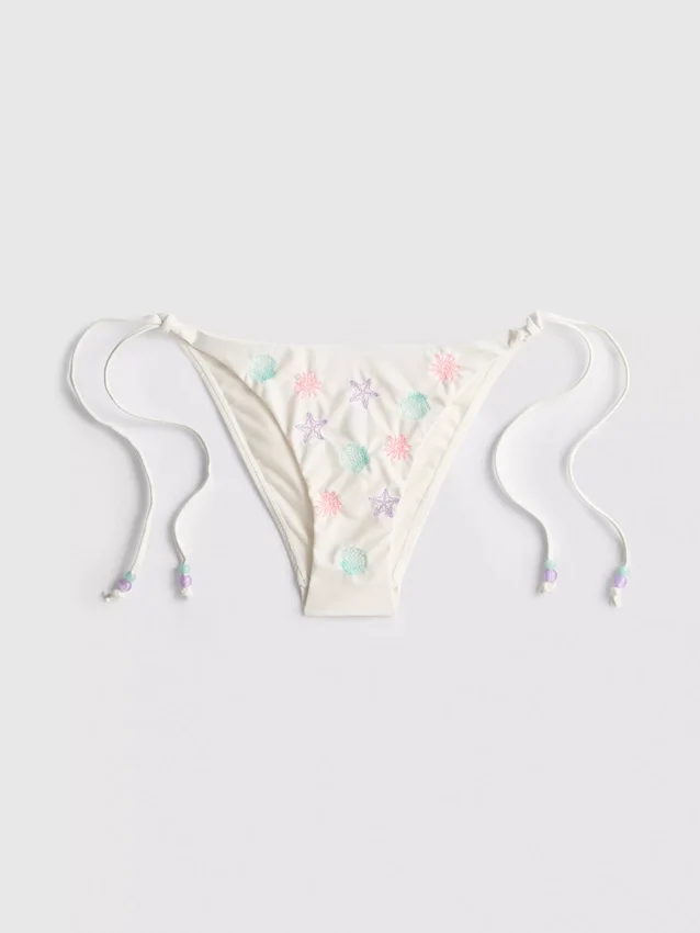 Bikinibukse med broderi og snøring i siden