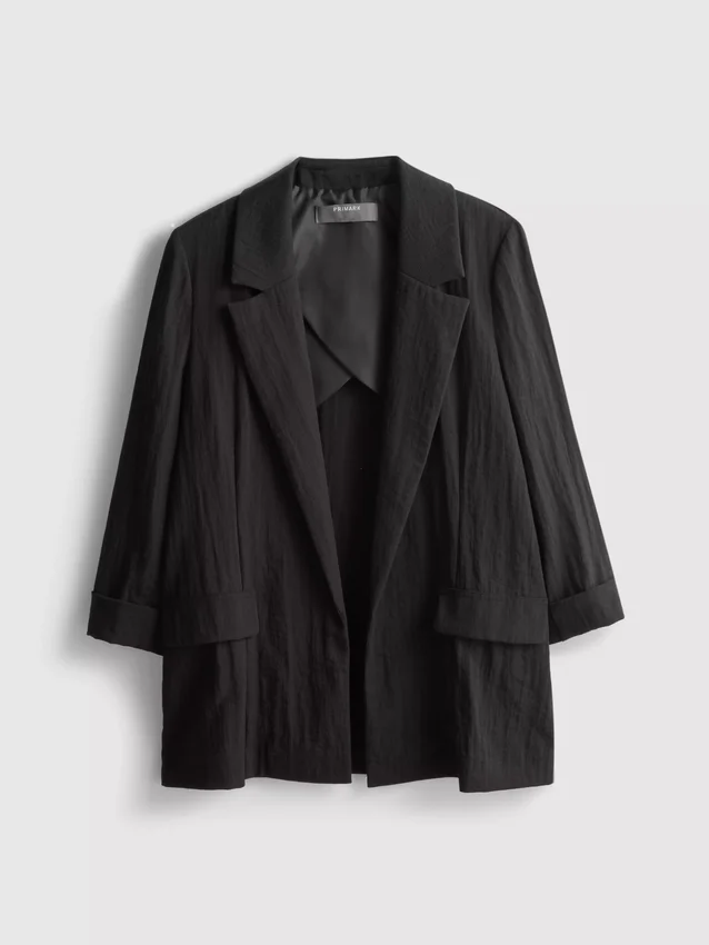 Blazer med strukturert, utskåret revers