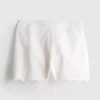 Bølgekantede, broderte bomullsshorts