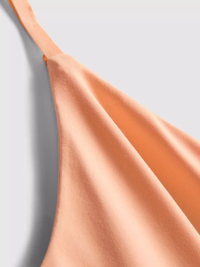 Bodysuit med V-hals og stropper
