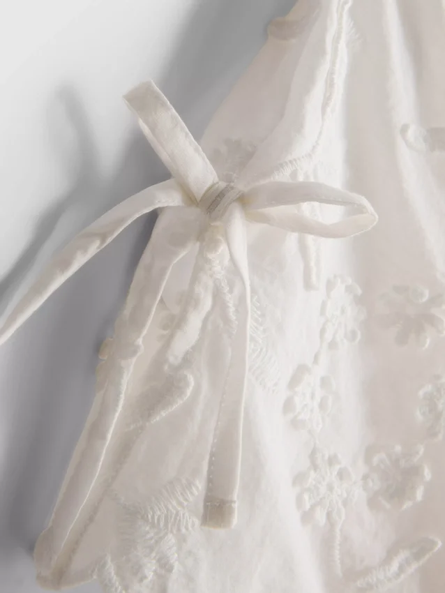 Broderte blomstermønstrede tank-top med bånd