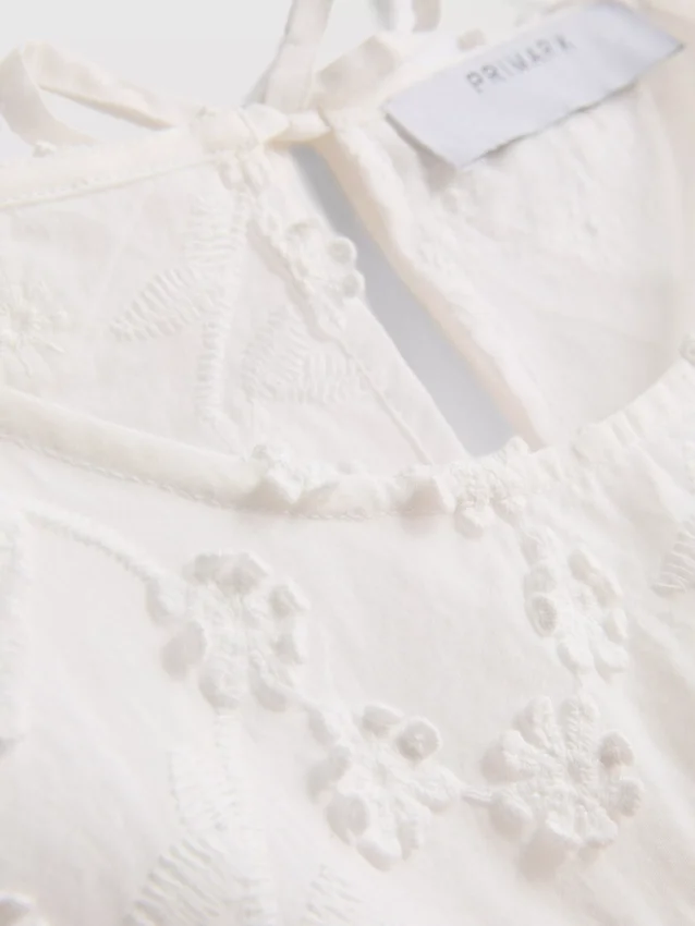 Broderte blomstermønstrede tank-top med bånd