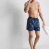 Broderte shorts med solmotiv