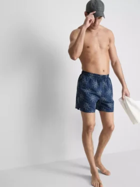 Broderte shorts med solmotiv