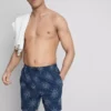 Broderte shorts med solmotiv