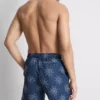 Broderte shorts med solmotiv