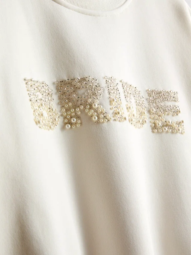 Brudegenser med broderte paljetter