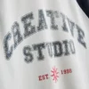 Creative Studio raglan-T-skjorte