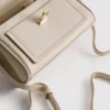 Crossbody-veske med skjerfdetaljer