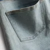 Denimshorts med middelhøy midje og oppbrett