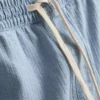 Denimshorts med strukturert snøring