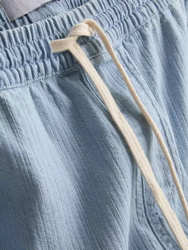 Denimshorts med strukturert snøring