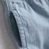 Denimshorts med strukturert snøring