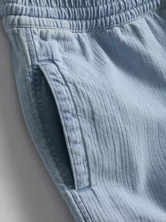 Denimshorts med strukturert snøring