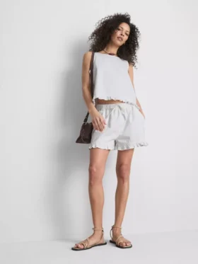 Denimshorts med volanger nederst